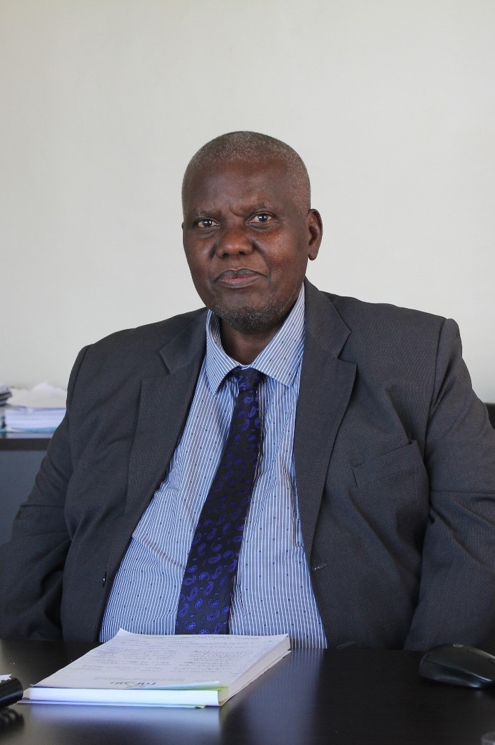 Dr James Asena